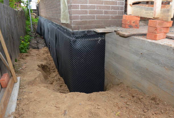 Happy homeowners after waterproofing job in Passaic